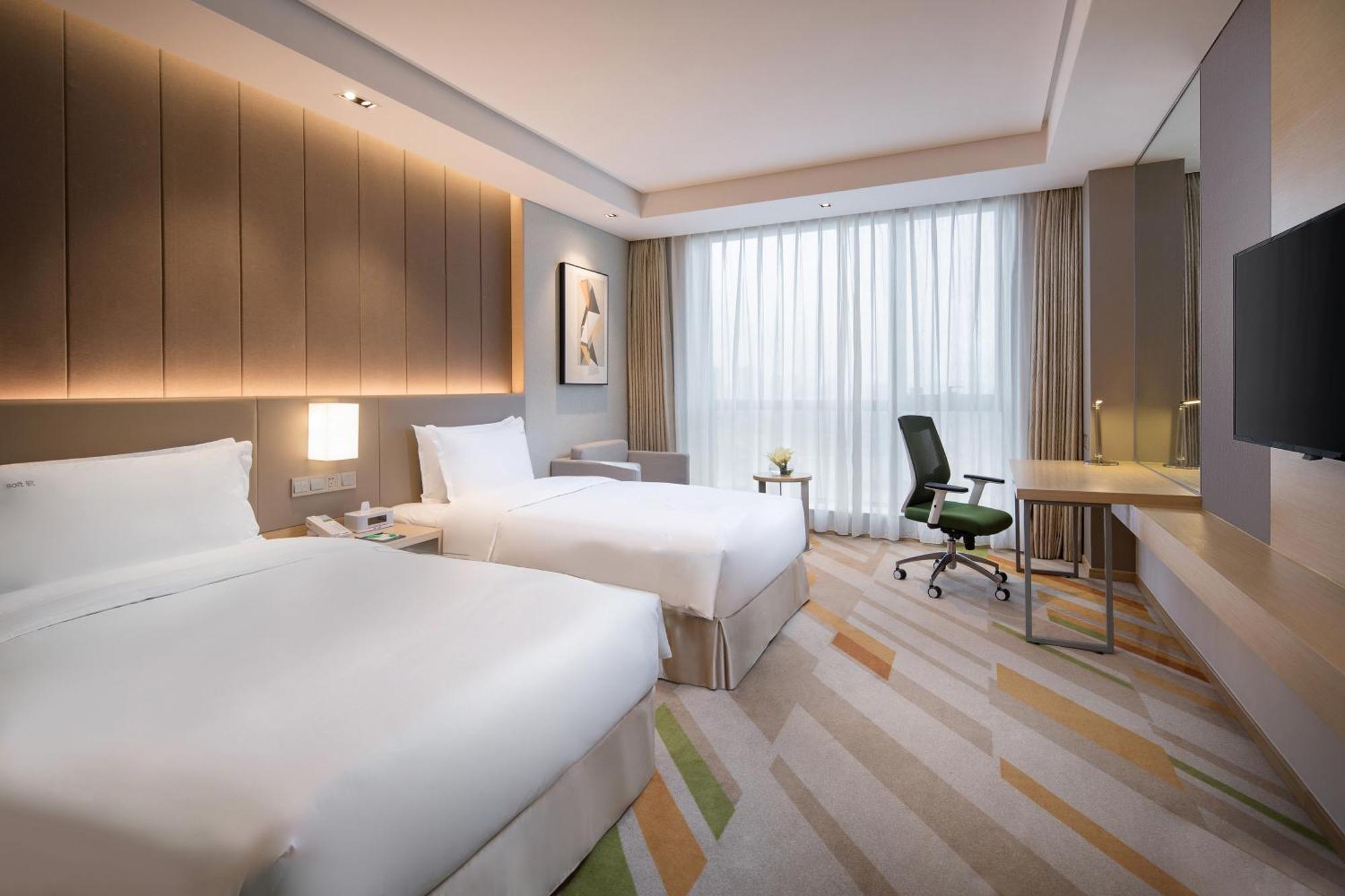 Holiday Inn Wuxi Taihu New City By Ihg Exterior photo